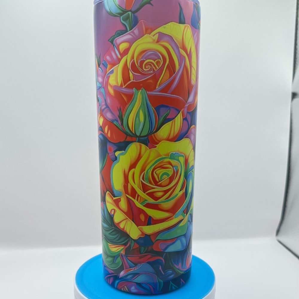 Gorgeous Neon Flowers Glow in Dark 20 oz tumbler.